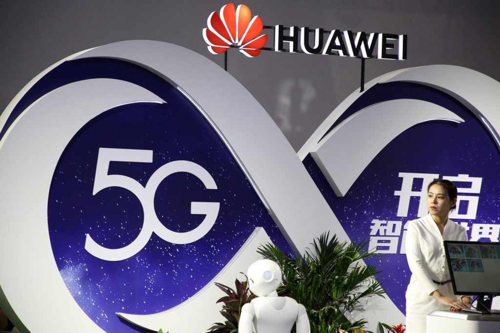 A Huawei booth featuring 5G technology in 2018 Samsung Appoints Roh Tae Moon as Head of Mobile Division as 5G Race Heats Up