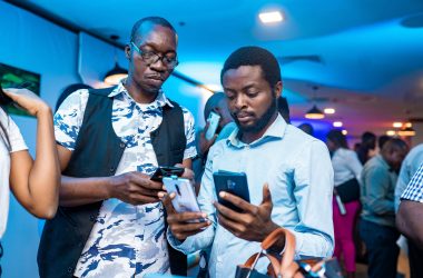 Guests examining the OPPO Reno2 device at the launch