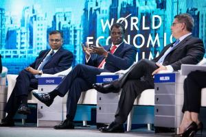 At the 2014 WEF meeting of champions in Taijin, China- (L-R) N Chandrasekaran, CEO Tata Consulting Services, Austin Okere, Founder CWG Plc, Rich Lesser, CEO Boston Consulting Services
