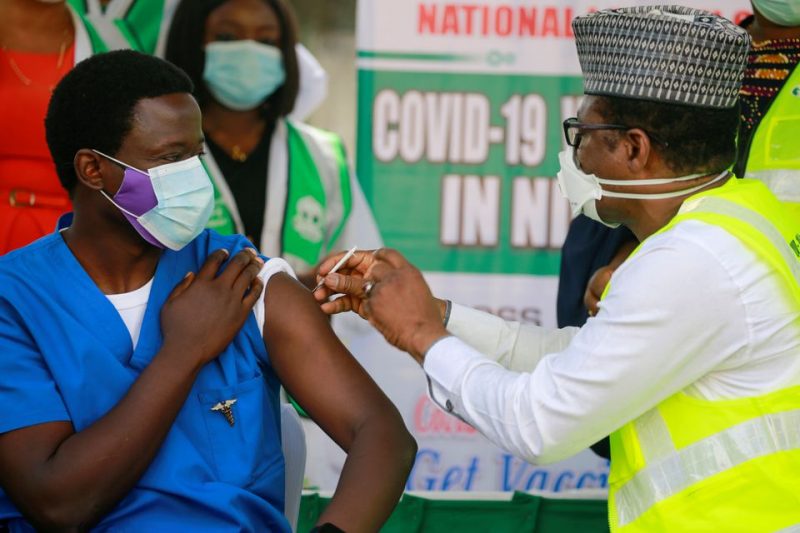 Nigerian being vaccinated