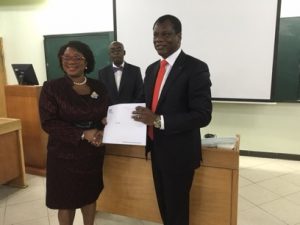 Justice Opeyemi Oke, representing the Chief Judge of Lagos State receiving the certificate of Participation